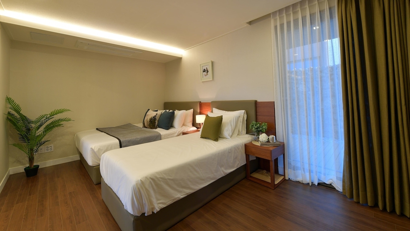 Imagen de la habitación del Hotel Arts Spa and Poolvilla. Foto 12