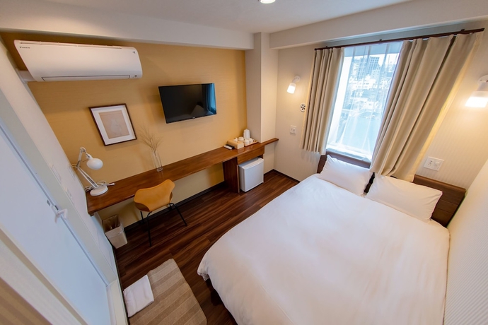 Imagen de la habitación del Hotel Artsy Inn. Foto 2