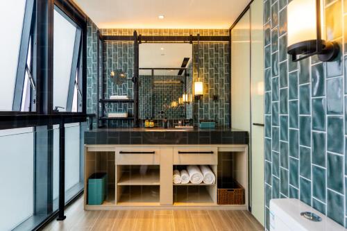 Imagen de la habitación del Hotel Artyzen Habitat Hengqin Zhuhai. Foto 11