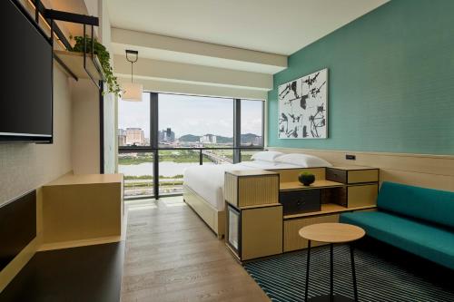 Imagen de la habitación del Hotel Artyzen Habitat Hengqin Zhuhai. Foto 14