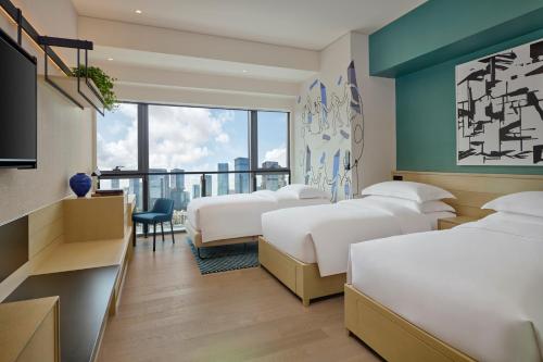 Imagen de la habitación del Hotel Artyzen Habitat Hengqin Zhuhai. Foto 15