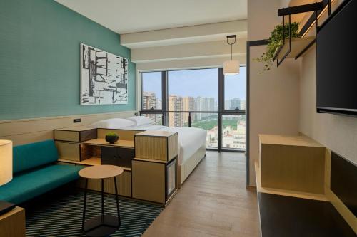 Imagen de la habitación del Hotel Artyzen Habitat Hengqin Zhuhai. Foto 17