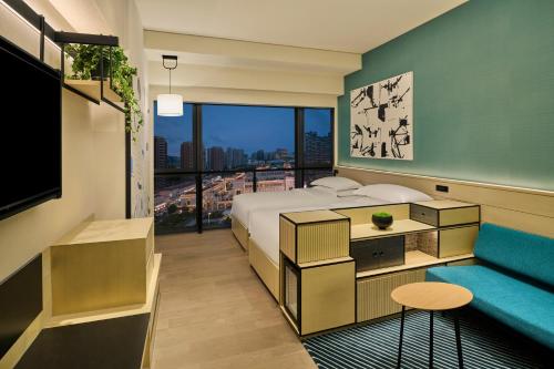 Imagen de la habitación del Hotel Artyzen Habitat Hengqin Zhuhai. Foto 20