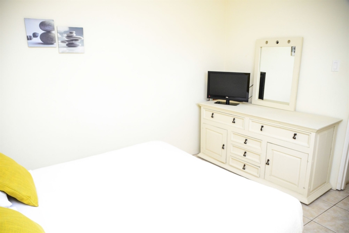 Imagen de la habitación del Hotel Aruba Tropic Apartments. Foto 7