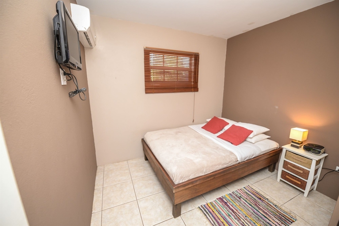 Imagen de la habitación del Hotel Aruba Tropic Apartments. Foto 10