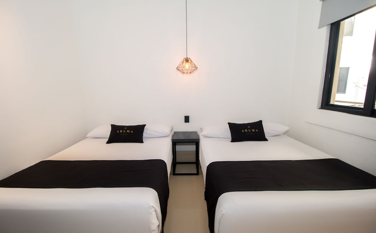 Imagen de la habitación del Hotel Aruma. Foto 4