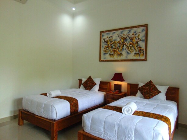 Imagen de la habitación del Hotel Arumanis Homestay. Foto 19