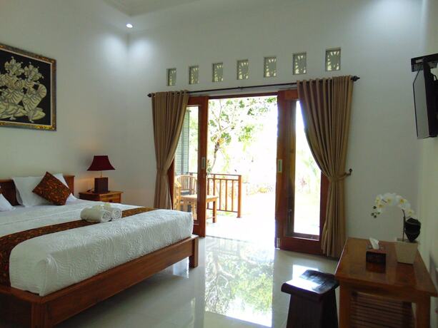 Imagen de la habitación del Hotel Arumanis Homestay. Foto 21