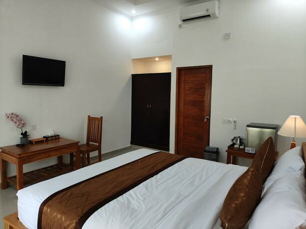 Imagen de la habitación del Hotel Arumanis Homestay. Foto 25