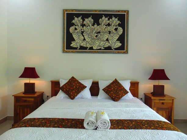 Imagen de la habitación del Hotel Arumanis Homestay. Foto 26