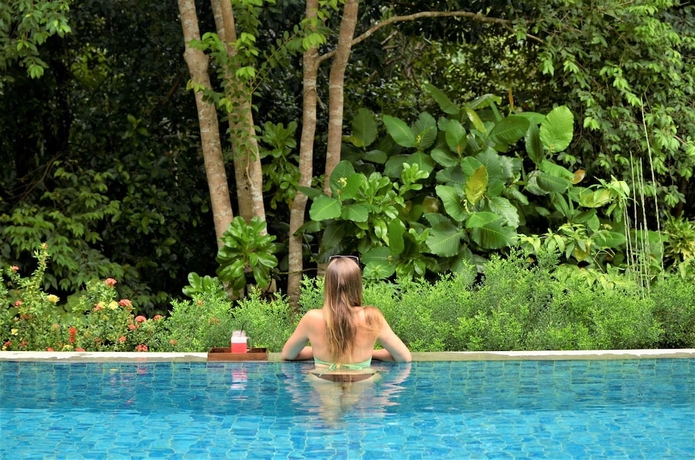 Imagen de la habitación del Hotel Arumdalu Private Resort. Foto 13