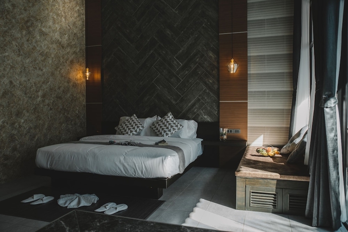 Imagen de la habitación del Hotel Arun Dara Villa. Foto 8