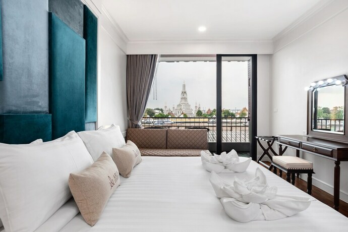 Imagen de la habitación del Hotel Arun Riverside Bangkok. Foto 27