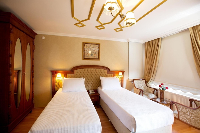 Imagen de la habitación del Hotel Aruna. Foto 7