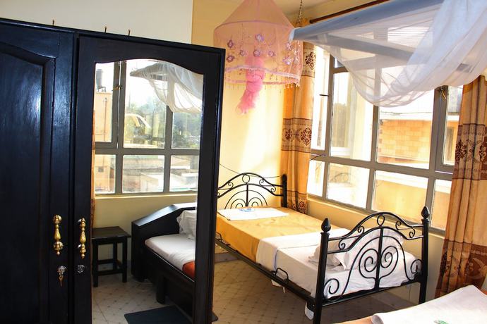 Imagen de la habitación del Hotel Arusha Bimel. Foto 4