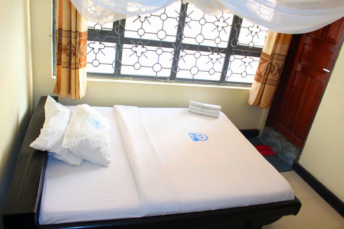 Imagen de la habitación del Hotel Arusha Bimel. Foto 5