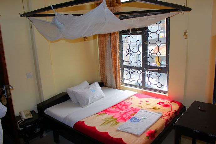 Imagen de la habitación del Hotel Arusha Bimel. Foto 9