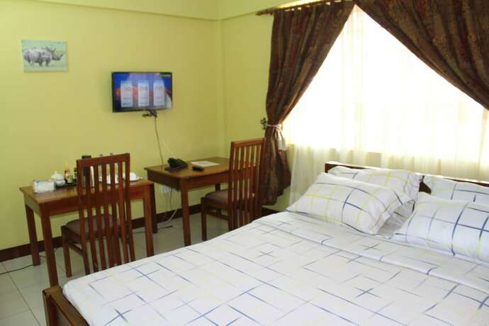 Imagen de la habitación del Hotel Arusha Family Retreat Resort. Foto 19