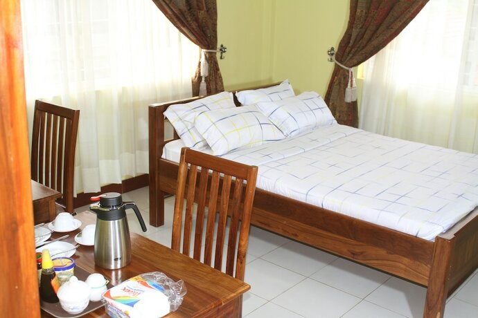 Imagen de la habitación del Hotel Arusha Family Retreat Resort. Foto 20