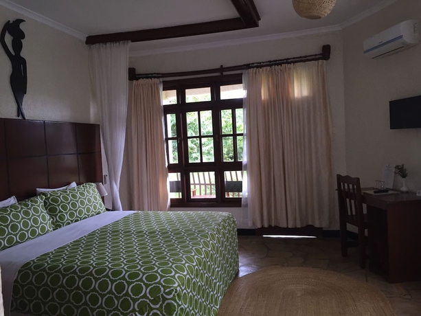 Imagen de la habitación del Hotel Arusha Planet Lodge. Foto 3