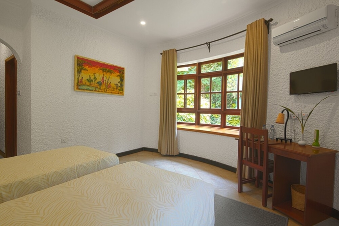 Imagen de la habitación del Hotel Arusha Planet Lodge. Foto 18