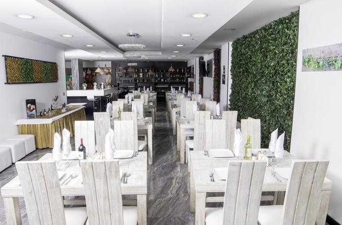 Imagen del bar/restaurante del Hotel Arvut Collection. Foto 2