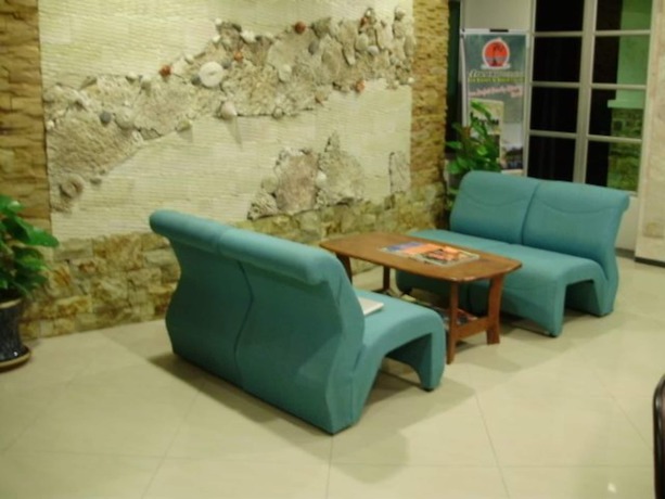Imagen de la habitación del Hotel Arwana Inn. Foto 6