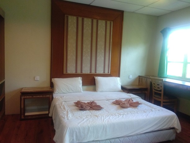 Imagen de la habitación del Hotel Arwana Inn. Foto 10