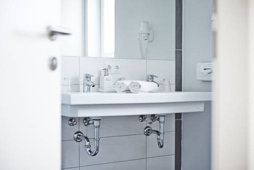 Imagen de la habitación del Hotel Arx Boutique. Foto 15