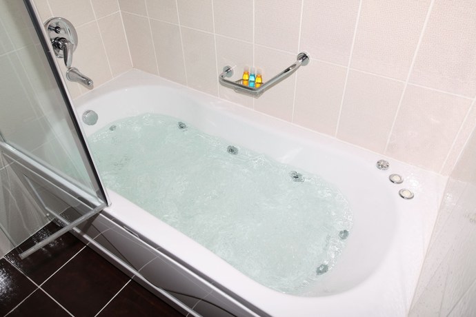 Imagen de la habitación del Hotel Arya Business Deluxe. Foto 10