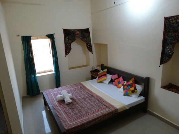 Imagen de la habitación del Hotel Arya Haveli. Foto 13