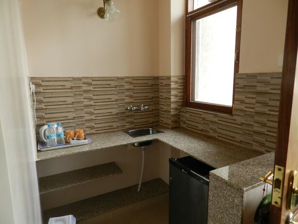 Imagen de la habitación del Hotel Arya Niwas. Foto 15