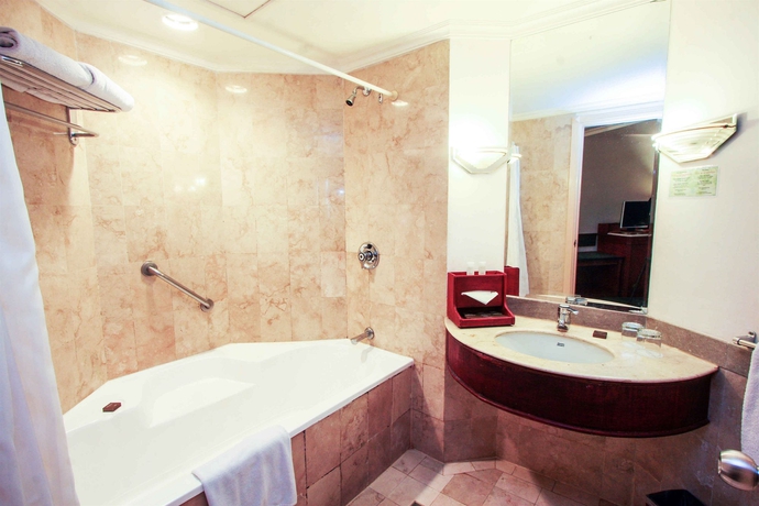Imagen de la habitación del Hotel Aryaduta Makassar. Foto 5