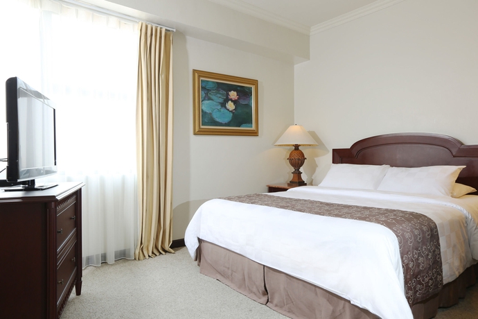 Imagen de la habitación del Hotel Aryaduta Suites Semanggi. Foto 4