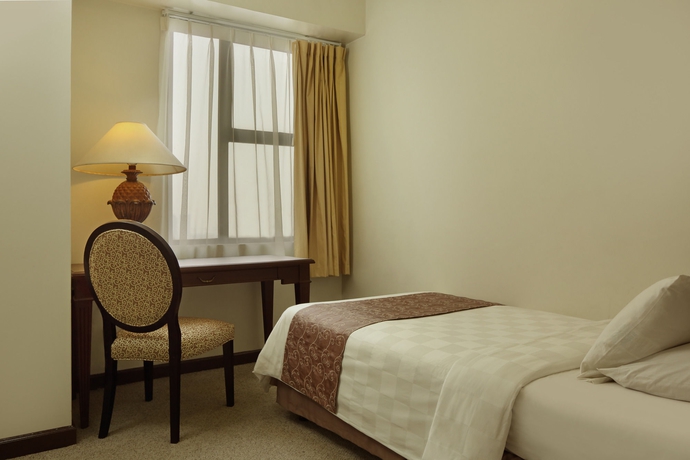 Imagen de la habitación del Hotel Aryaduta Suites Semanggi. Foto 5
