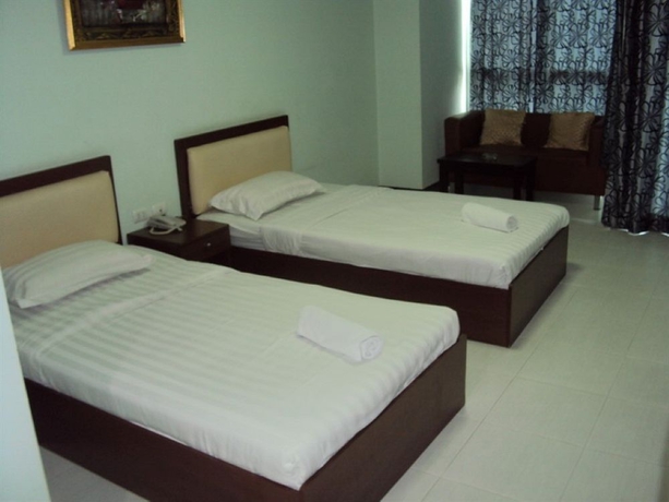 Imagen de la habitación del Hotel Aryan Suites. Foto 8