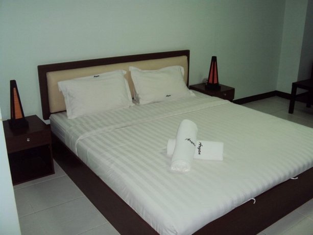 Imagen de la habitación del Hotel Aryan Suites. Foto 10