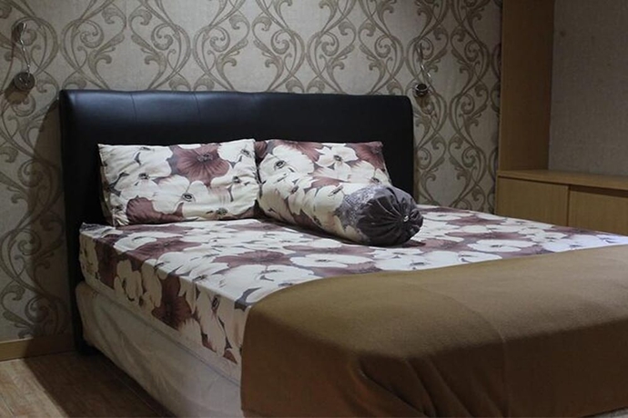 Imagen de la habitación del Hotel Aryani Suites Syariah. Foto 7