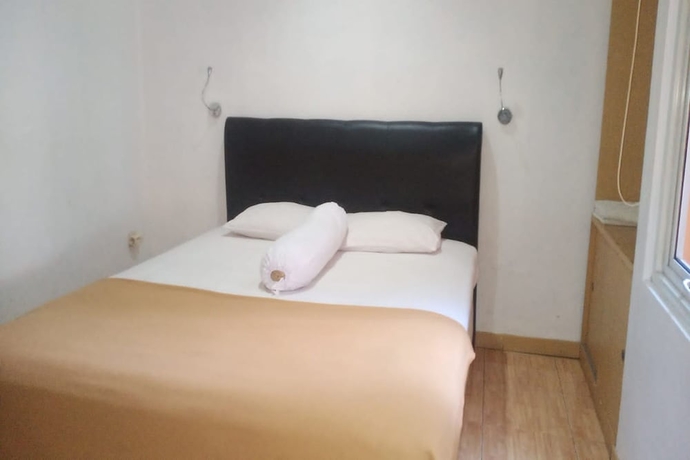 Imagen de la habitación del Hotel Aryani Suites Syariah. Foto 11
