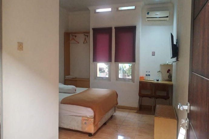 Imagen de la habitación del Hotel Aryani Suites Syariah. Foto 13