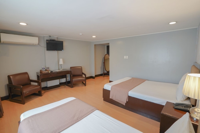 Imagen de la habitación del Hotel Arzo Manila. Foto 16