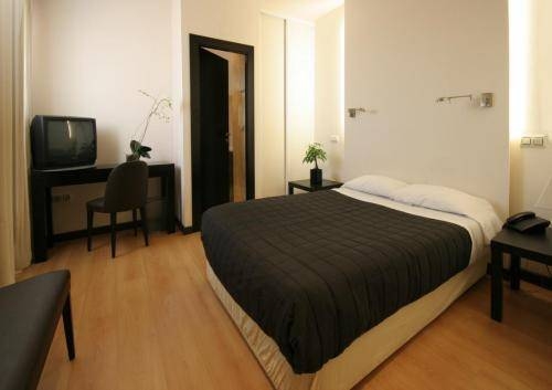 Imagen de los interiores del Hotel Asador H.m. Versus. Foto 6