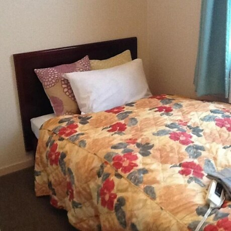 Imagen de la habitación del Hotel Asahi City Inn. Foto 20