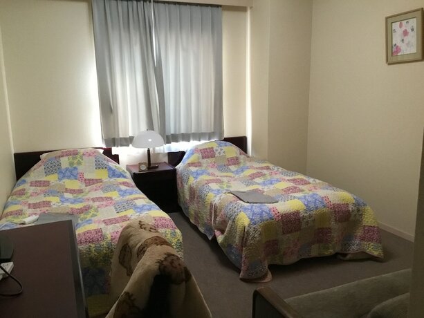 Imagen de la habitación del Hotel Asahi City Inn. Foto 24
