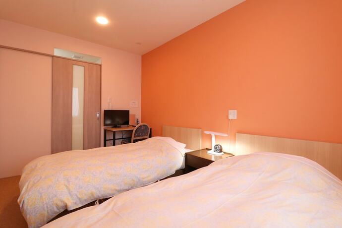 Imagen de la habitación del Hotel Asahi Grandeur Fuchu. Foto 3