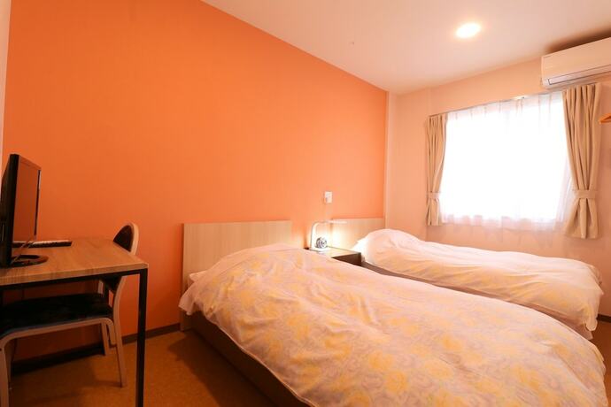 Imagen de la habitación del Hotel Asahi Grandeur Fuchu. Foto 12