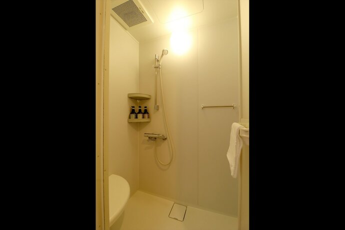 Imagen de la habitación del Hotel Asahi Grandeur Fuchu. Foto 15