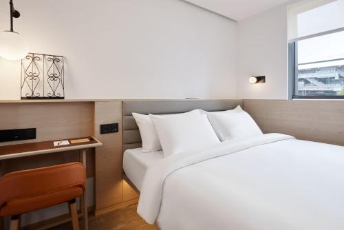 Imagen de la habitación del Hotel Asai Bangkok Sathorn. Foto 14