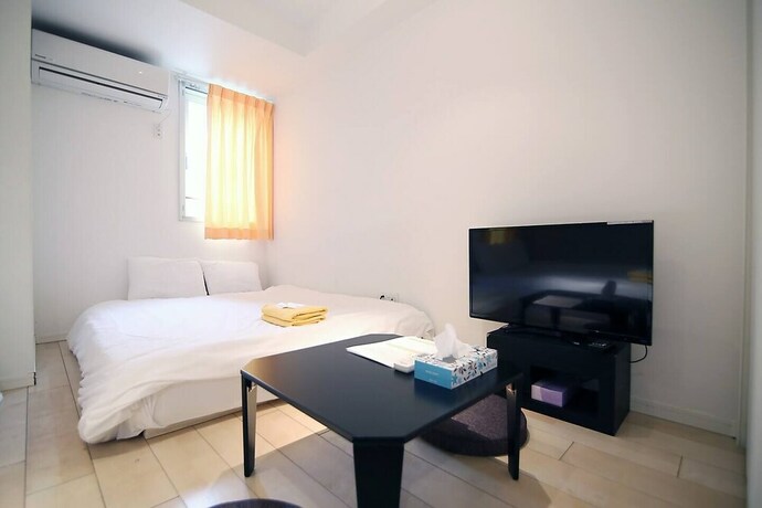 Imagen de la habitación del Hotel Asakusa Koma House. Foto 13