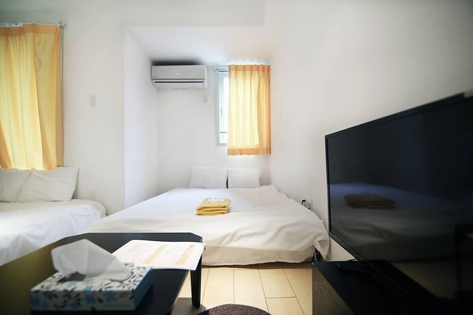 Imagen de la habitación del Hotel Asakusa Koma House. Foto 16